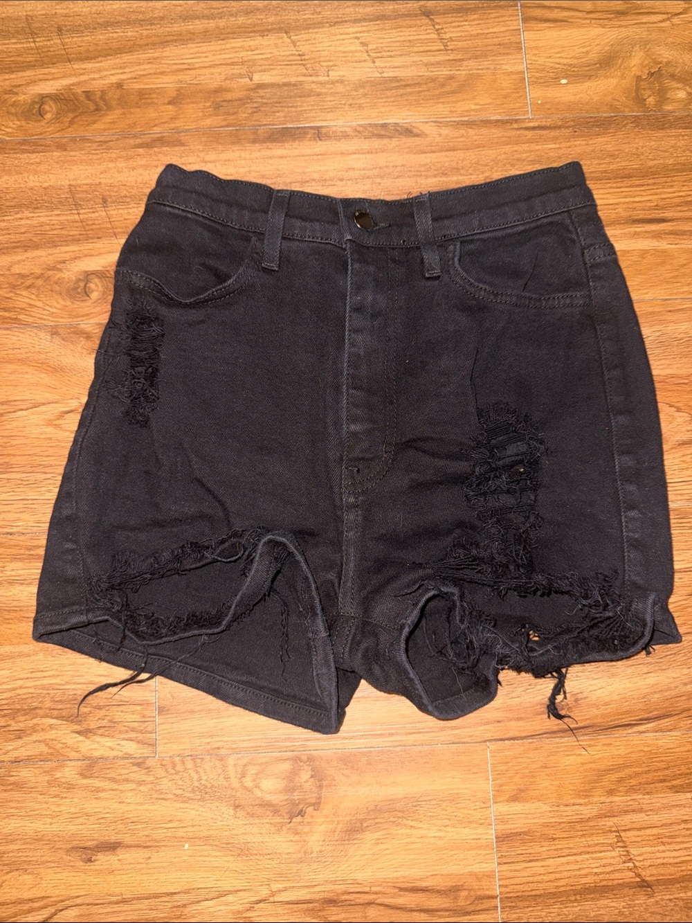 Vibrant Black Distressed Denim Shorts